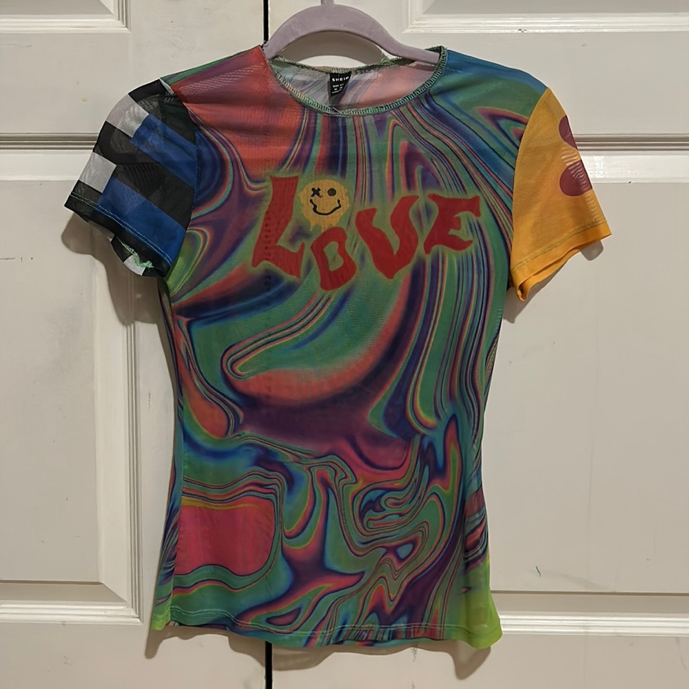 Sheer multi color top. Worn only once.